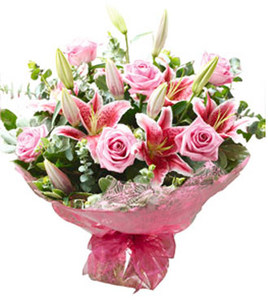 Bouquet with pink roses and lilies